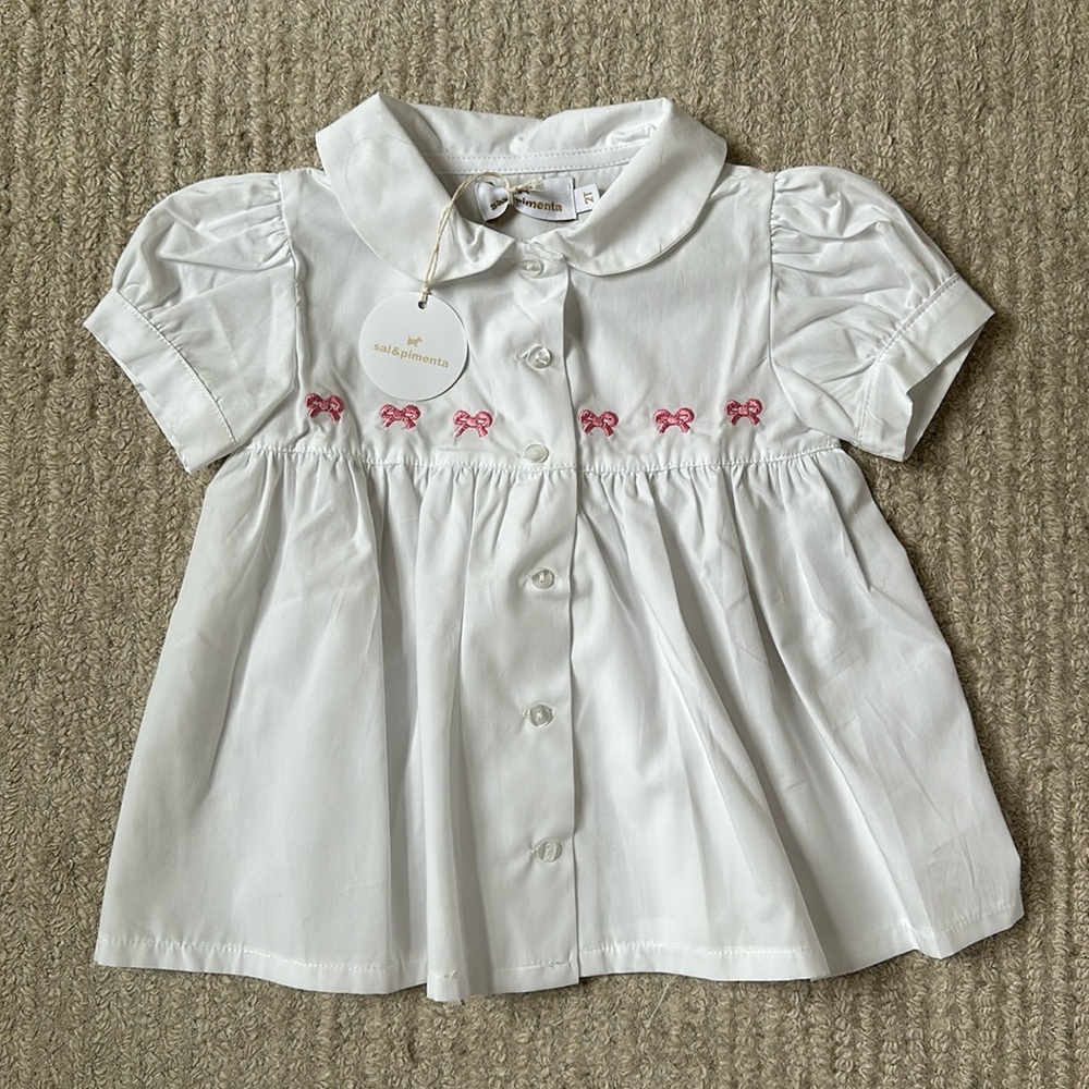 Sal & Pimenta white puff sleeve top with pink bows